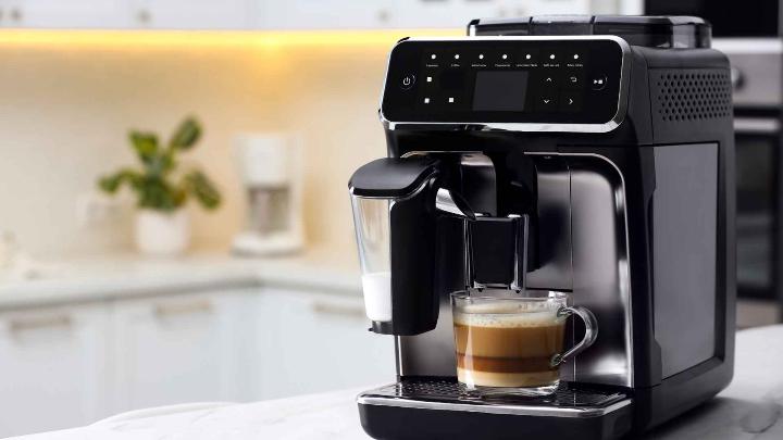 An image showing a modern Espresso machine brewing espresso coffee