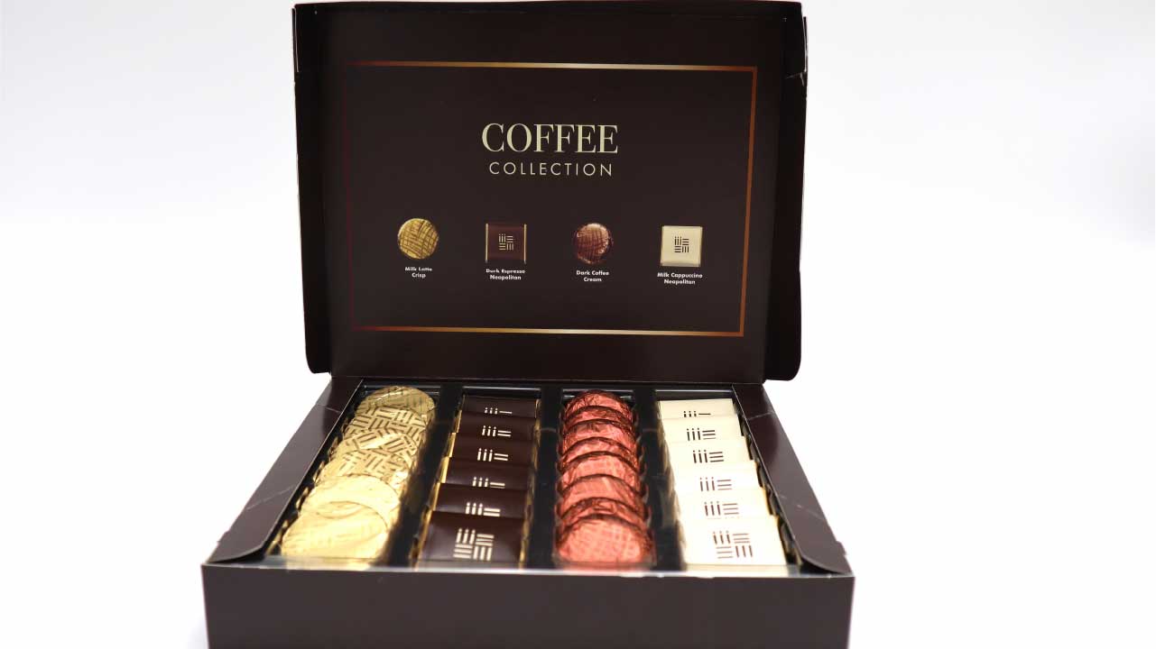 A heartfelt gift box filled with delectable coffee-infused treats, perfect for a memorable and unique occasion gift, extending a gesture of spreading joy.