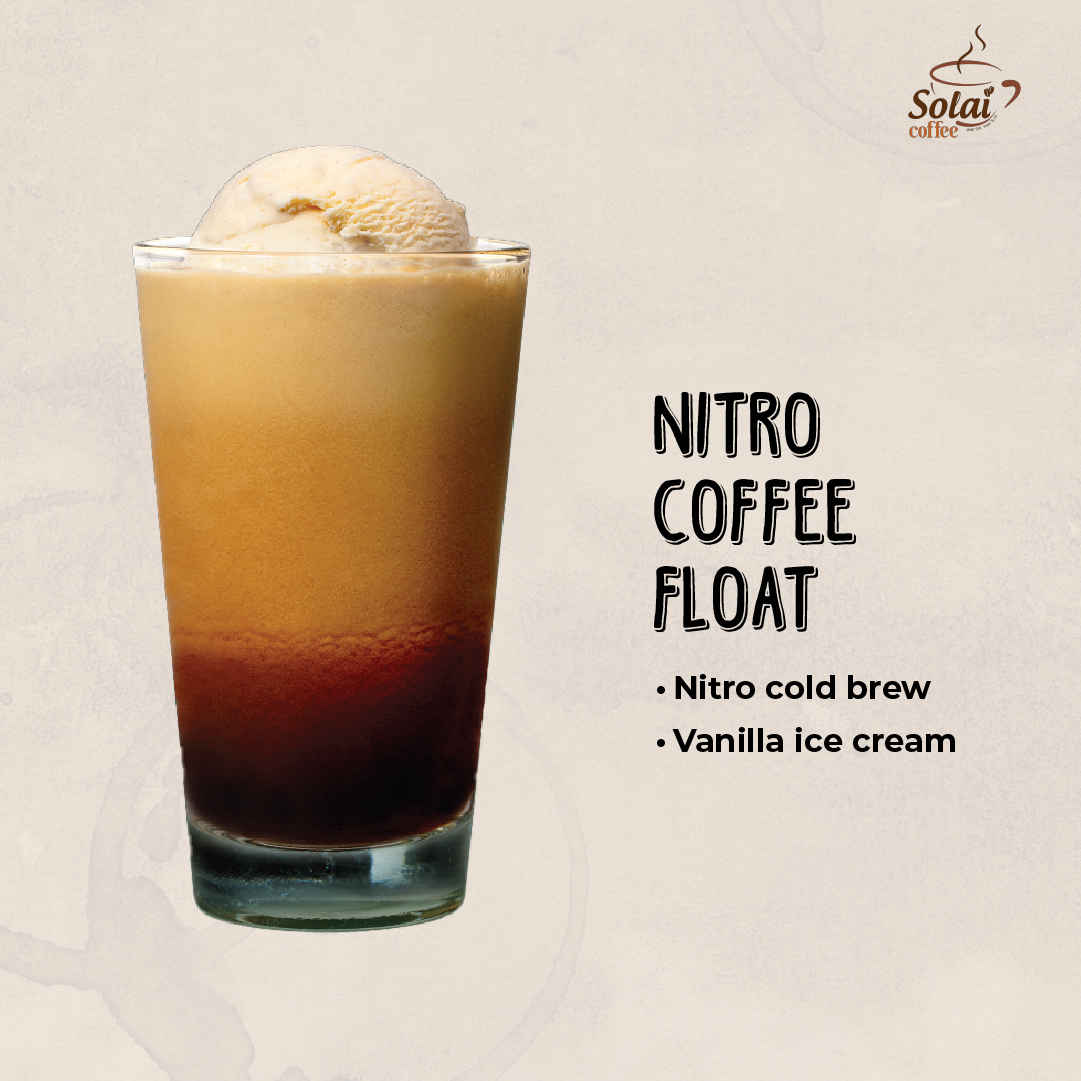 A tall glass filled with Nitro Coffee Float, showcasing cascading nitrogen-infused cold brew coffee topped with a scoop of vanilla ice cream, creating a creamy and frothy summer coffee treat.