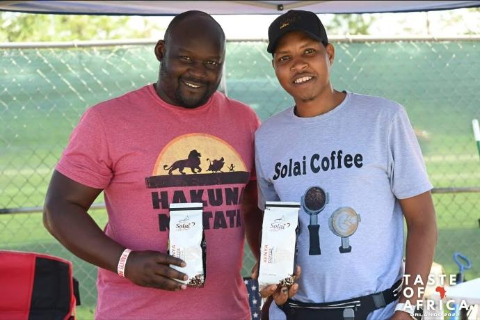 Peter Kuria captures a moment with a delighted coffee enthusiast, proudly displaying the exquisite Kenya Specialty Coffee pack featured in Orlando Voyager magazine.