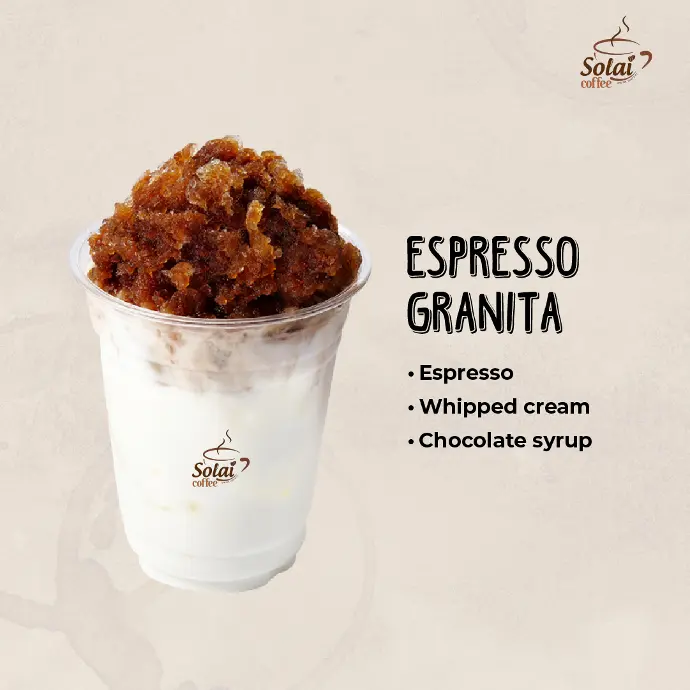 Espresso Granita A cup of espresso granita with fine, frozen coffee crystals on top.