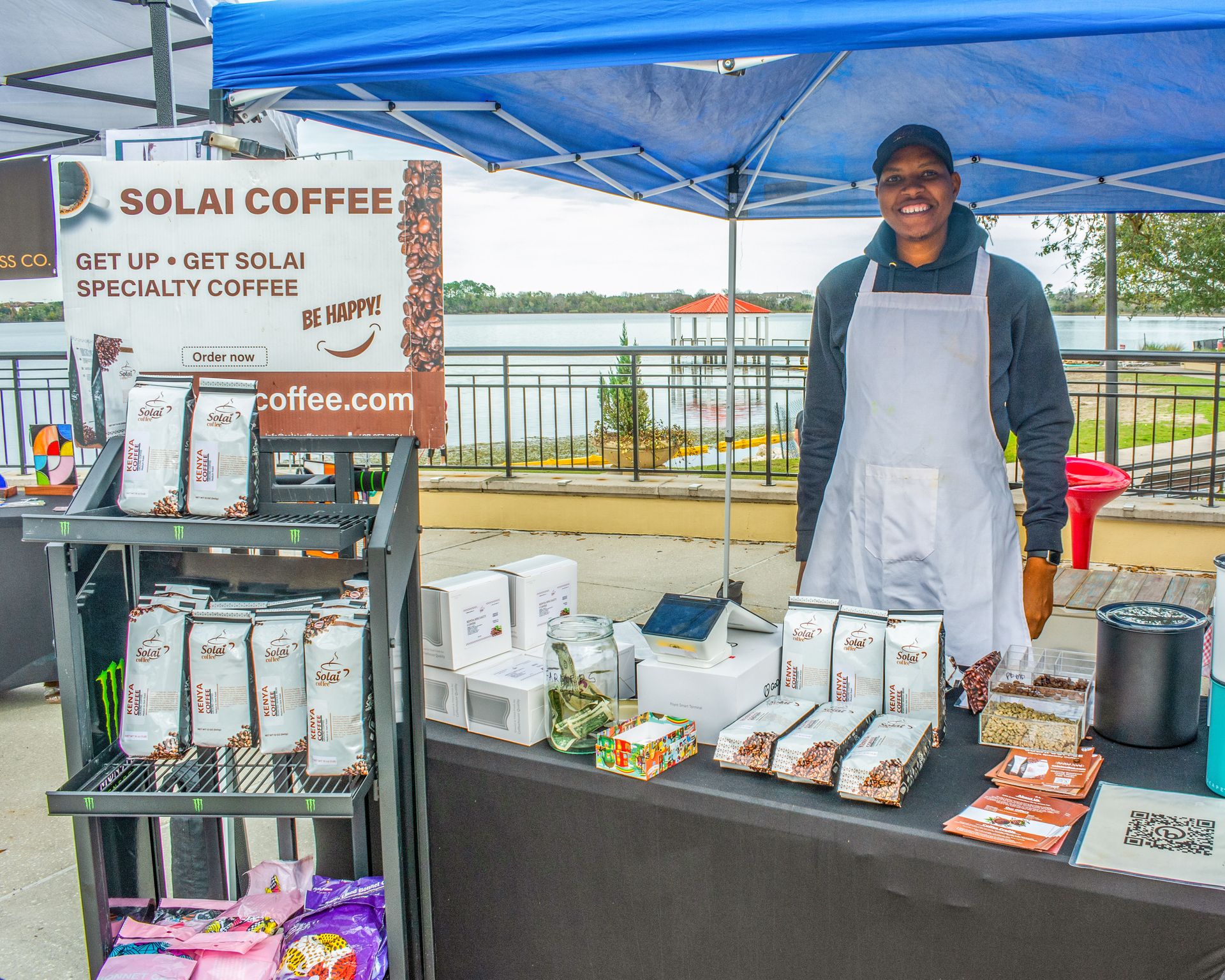 Mr. Peter Kuria, Solai Coffee CEO, showcasing Kenyan Specialty Coffee and coffee accessories at Baldwin Park community market, Orlando Florida.