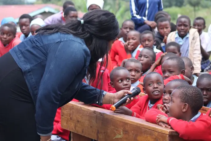 Monica engaging one on one with students 
