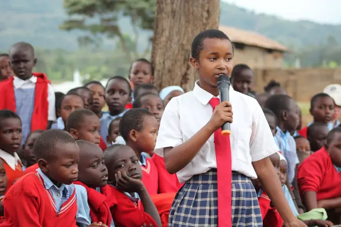 A school girl giving vote of thanks to Solai Coffee team at the end of school visit event
