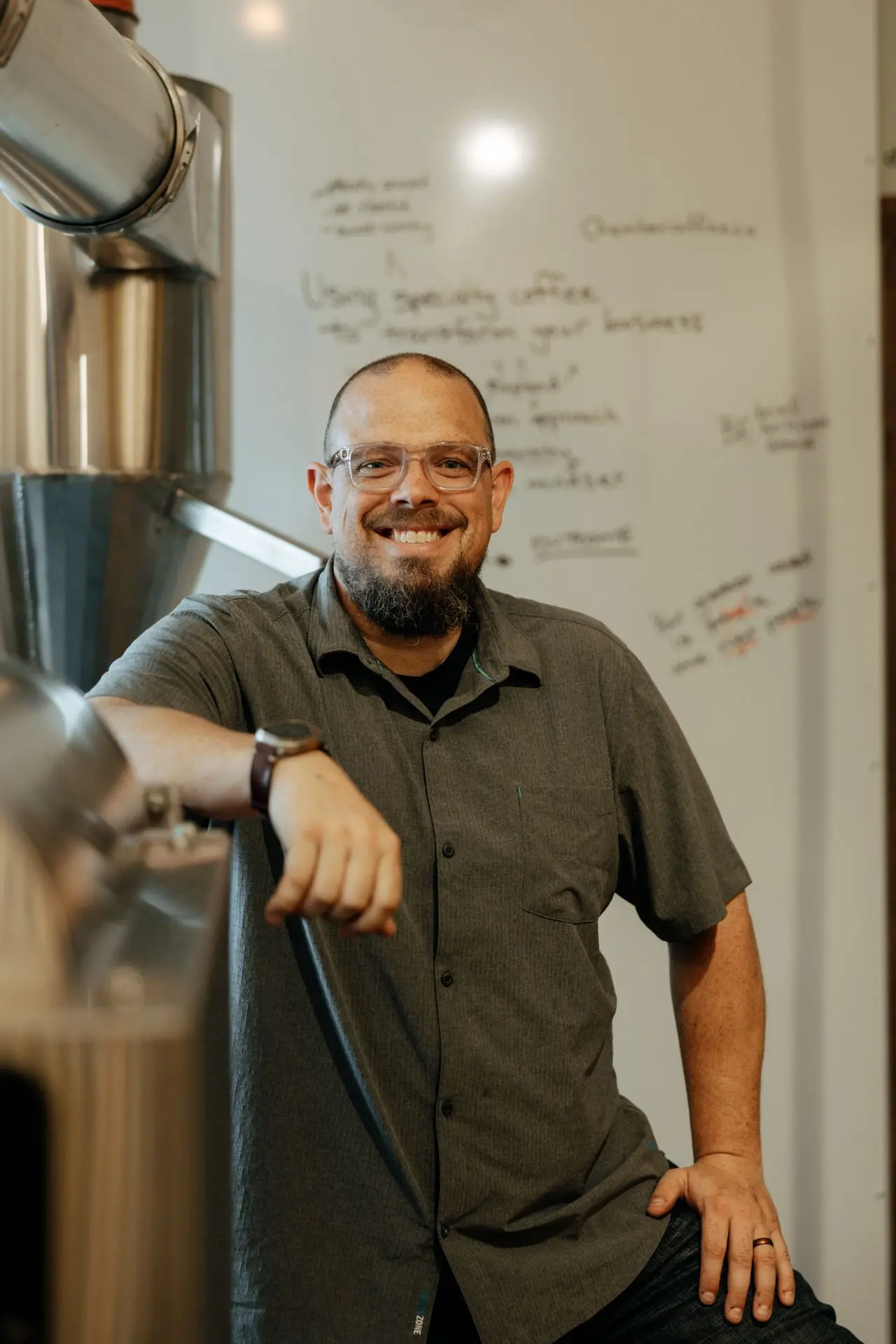 Matt pauses for a photo inside ember roastery 