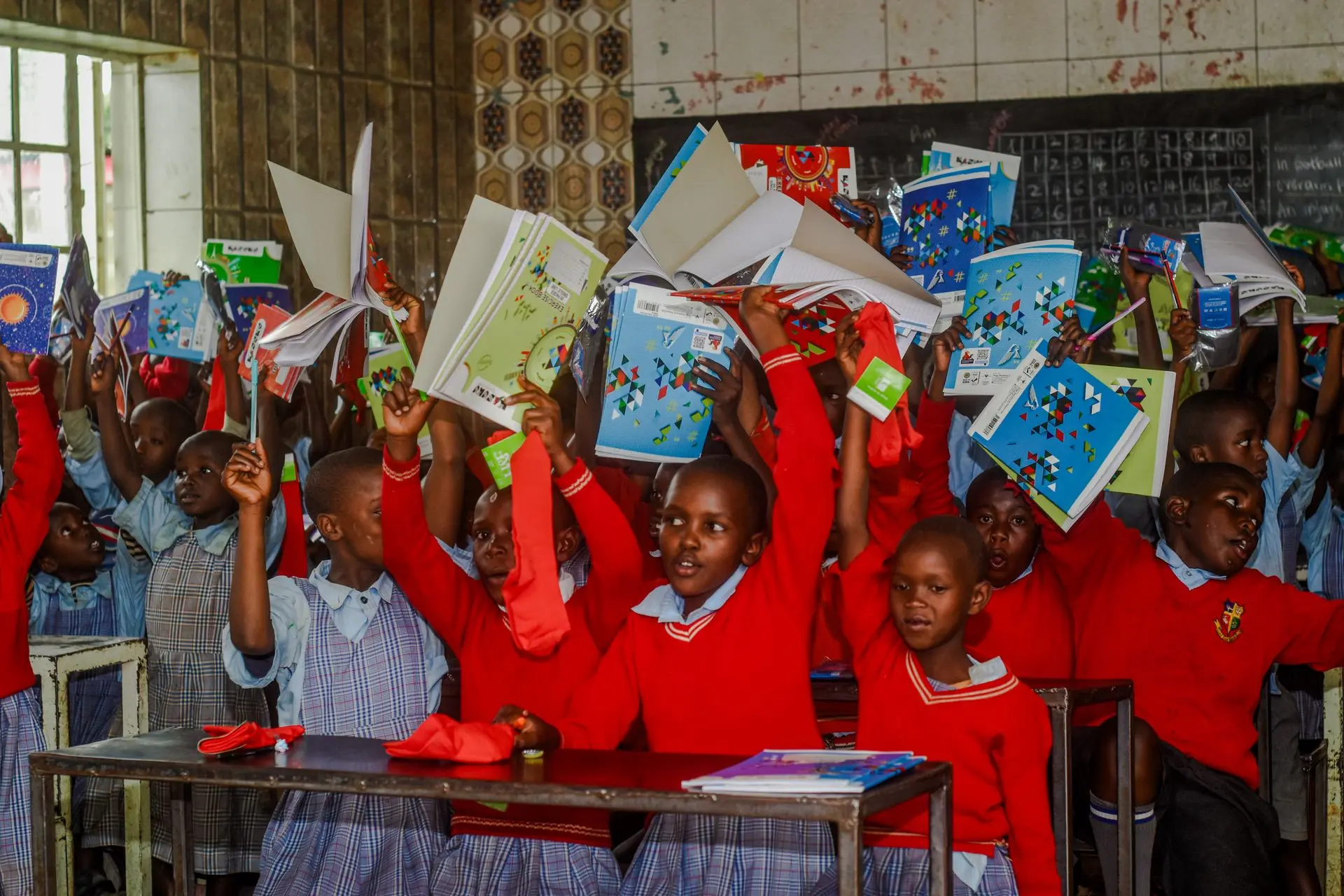 Moments of pure joy — Nyakinyua students celebrating birthdays with teachers, community partners, and friends from Solai Coffee.