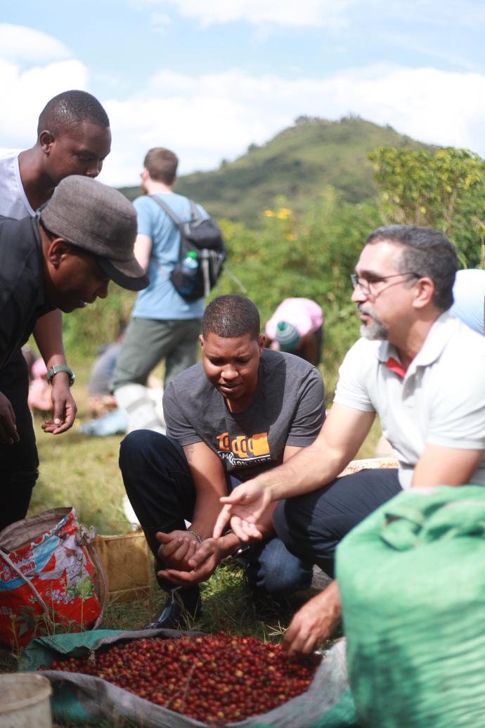 Coffee farmers enjoy a conversation during the coffee harvest season. 